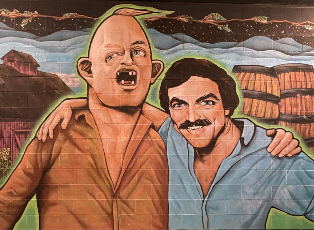 A mural of good friends Sloth and Tom Selleck at Burial